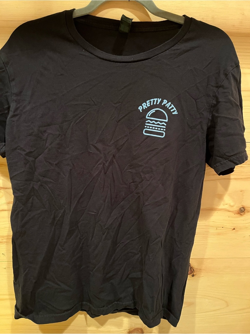 H&M Black Short Sleeve Tee with Light Blue 'Pretty Patty' Logo